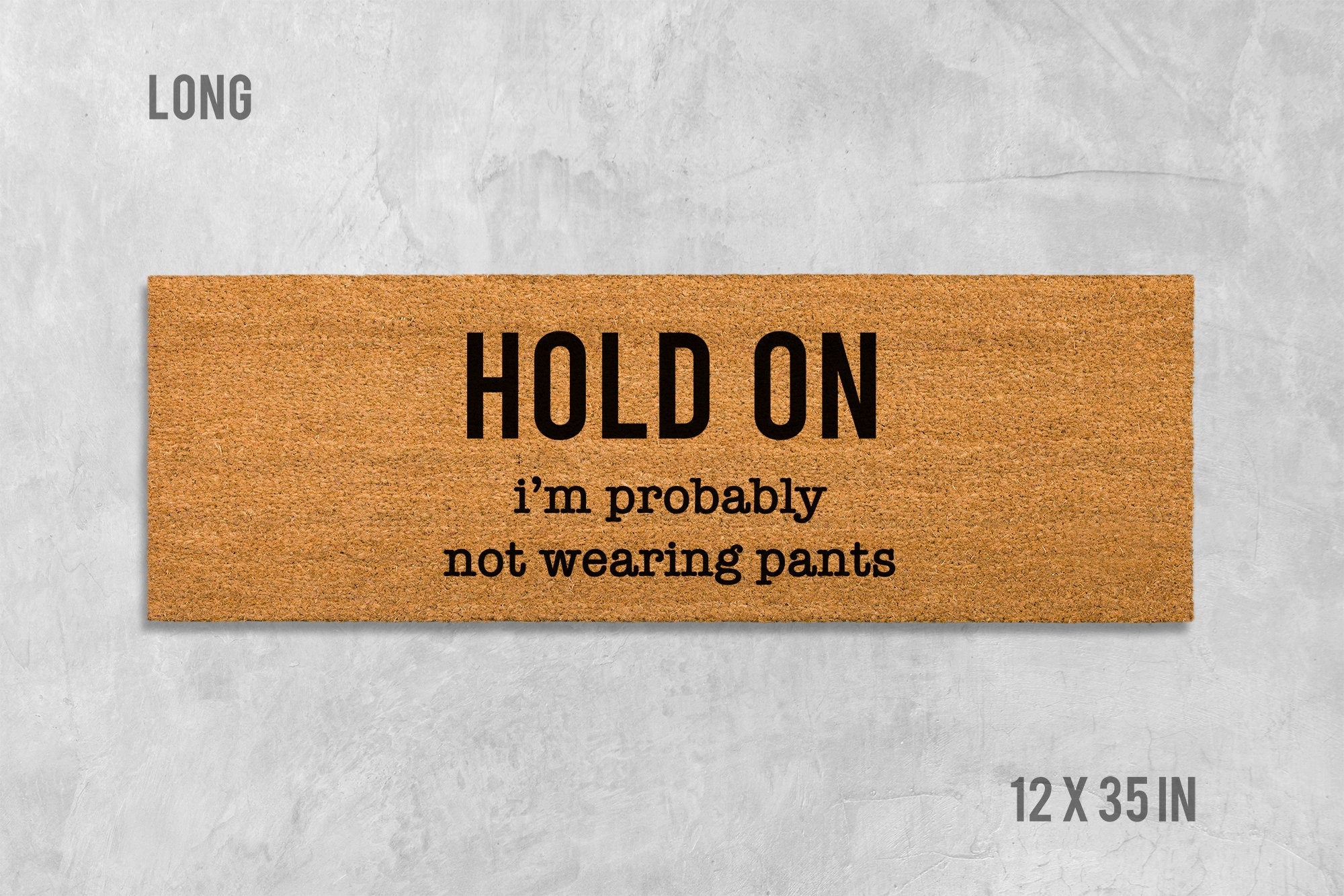 Funny Door Mat: 'Hold On We're Not Wearing Pants' (Housewarming Gift)