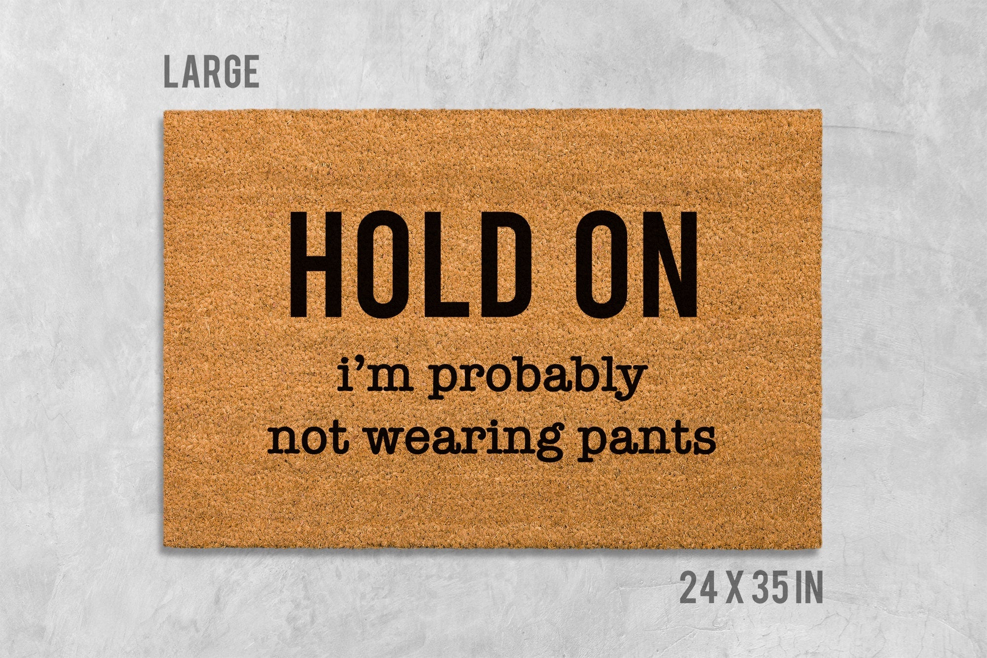 Funny Door Mat: 'Hold On We're Not Wearing Pants' (Housewarming Gift)