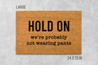 Funny Door Mat: 'Hold On We're Not Wearing Pants' (Housewarming Gift)